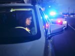 Lady pulled over charged with a DUI / OWI .